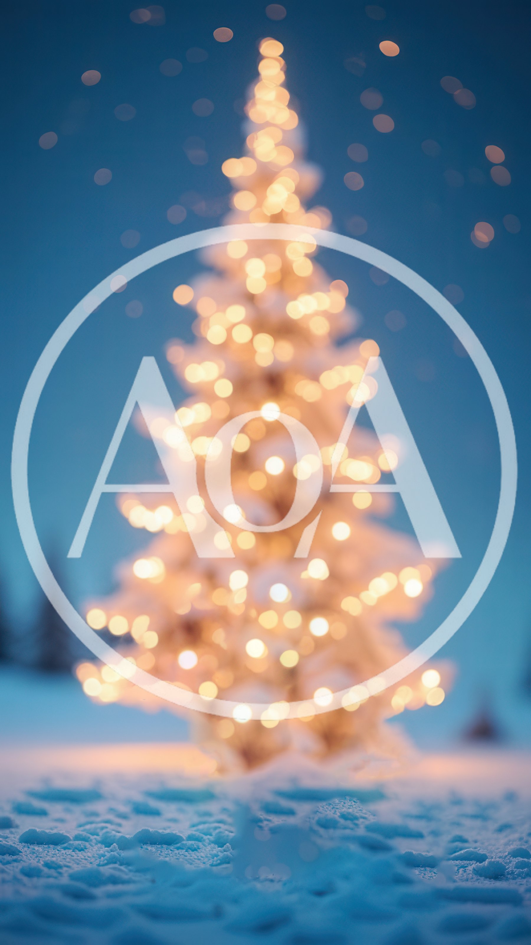 Blurred Christmas Tree With Glowing Lights In Snowy Landscape