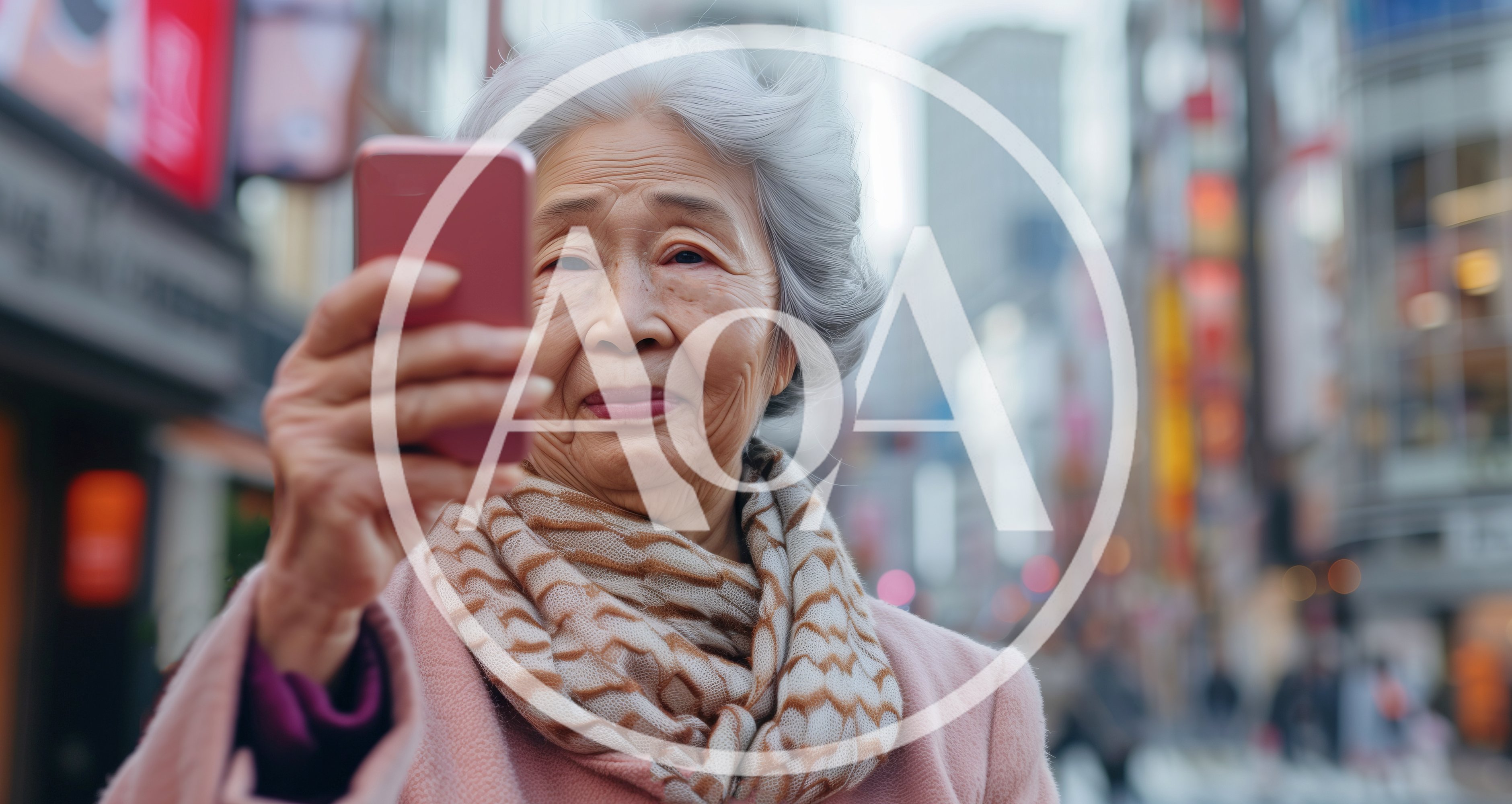 Elderly Asian Woman Taking Selfie In City Street