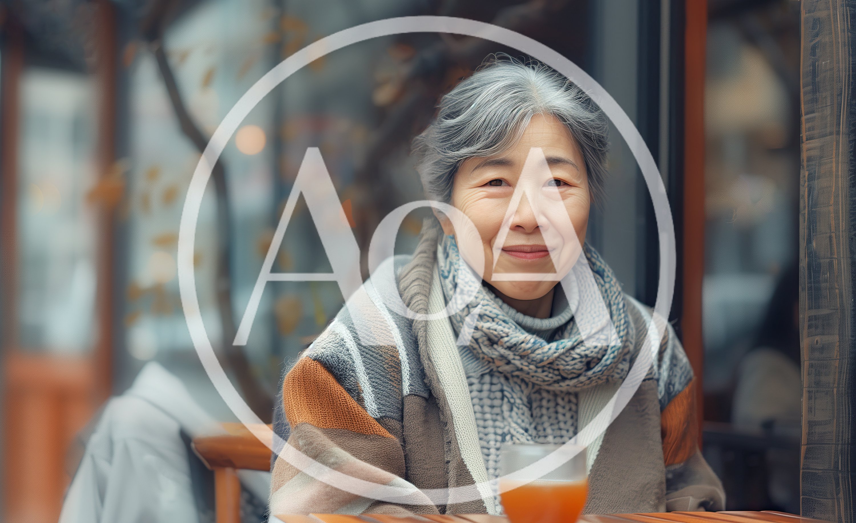 Senior Asian Woman Enjoying Tea At A Cafe
