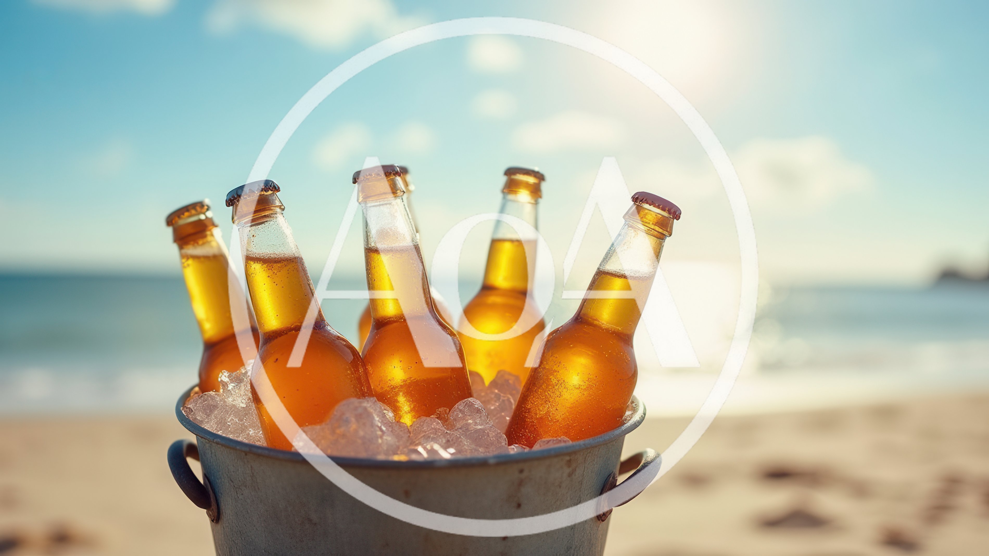 Cold Beer Bottles In Ice Bucket On Beach