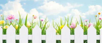 Easter Eggs Hidden in Spring Garden with White Fence