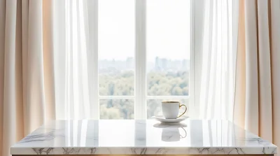 Coffee Cup on Marble Table by Window