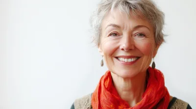 Portrait Of A Smiling Mature Woman With Grey Hair