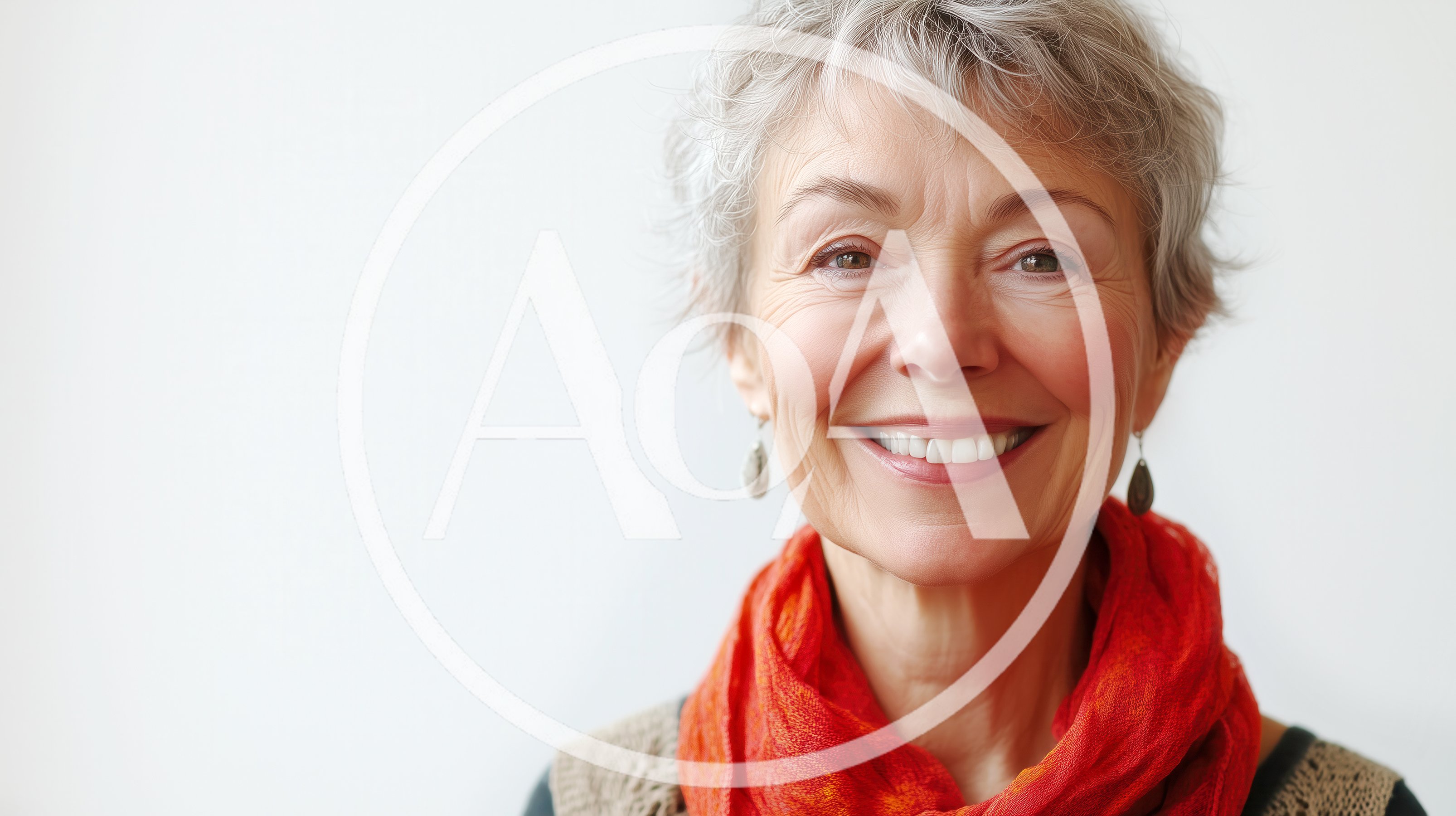 Portrait Of A Smiling Mature Woman With Grey Hair