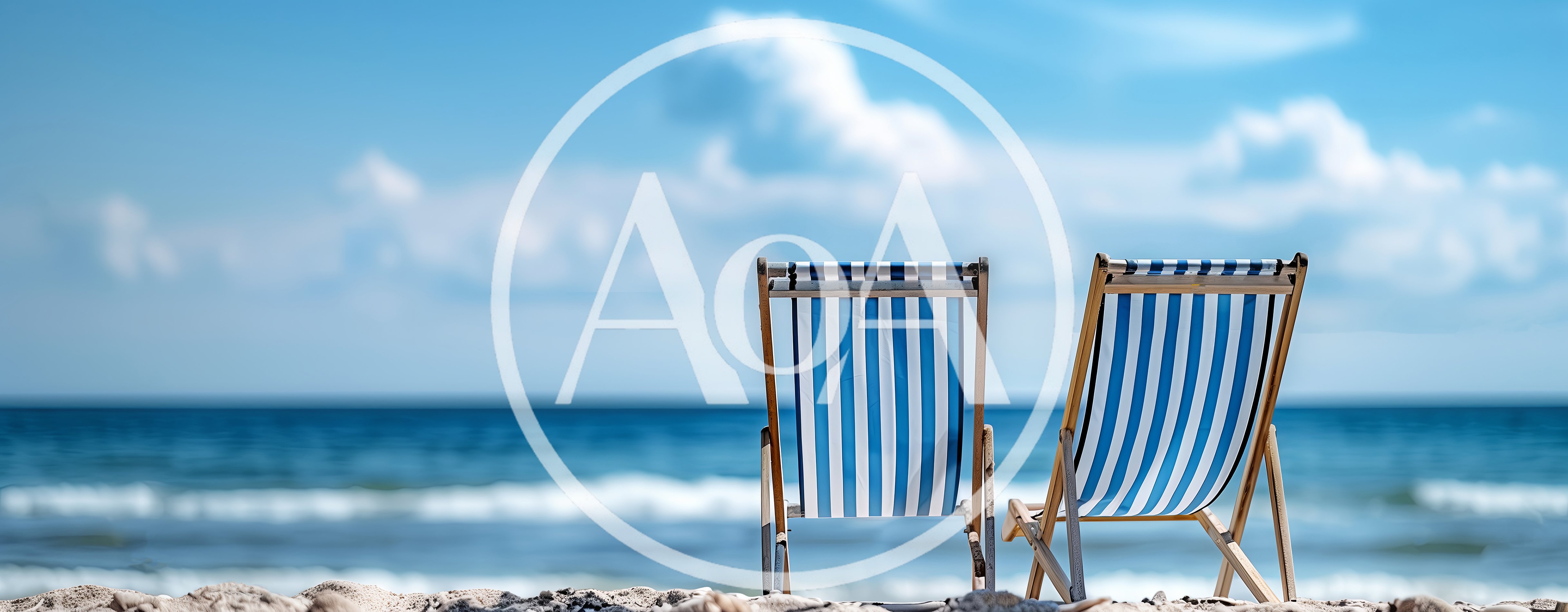 Two Striped Beach Chairs Facing The Ocean