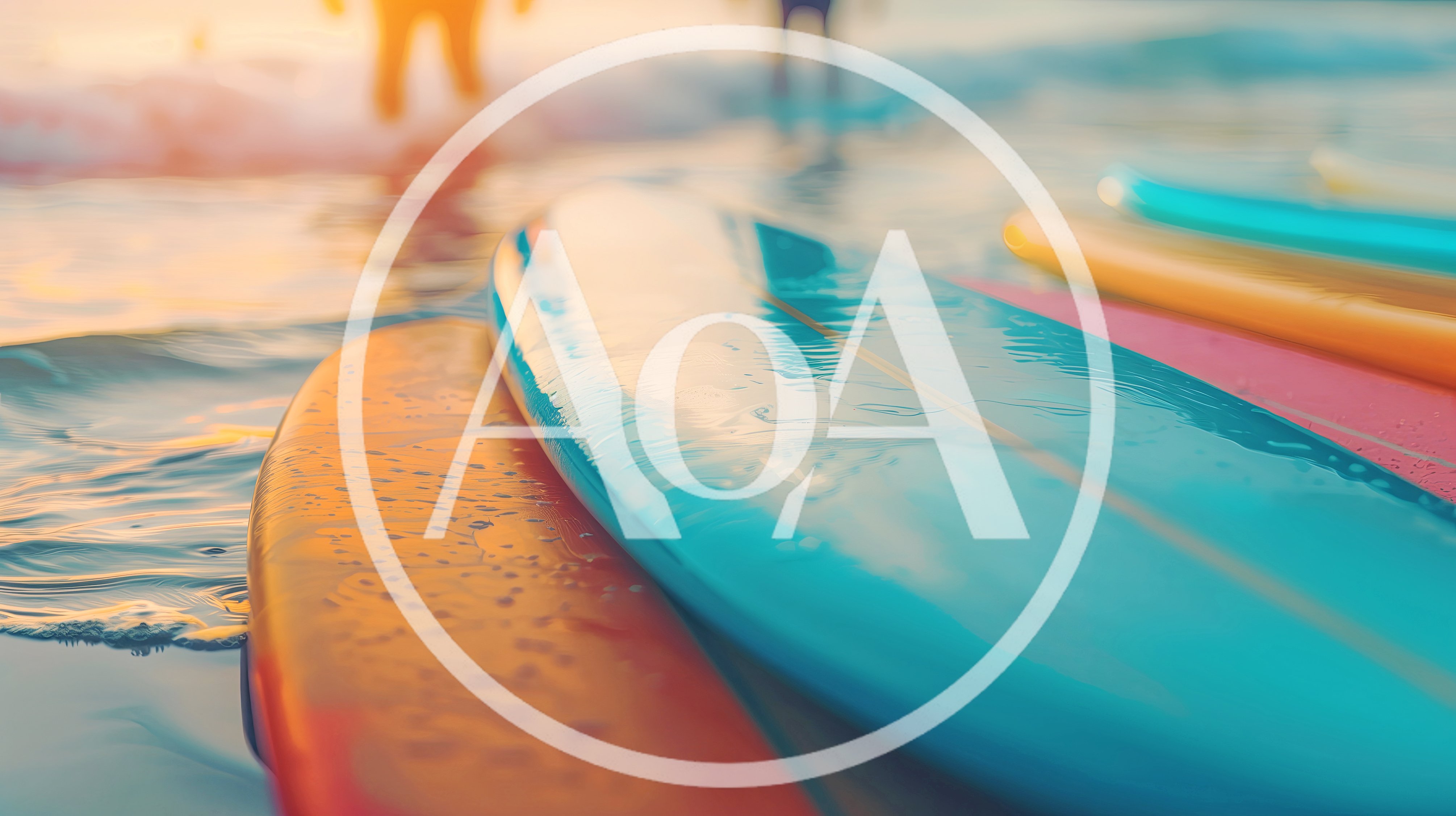 Colorful Surfboards Resting On The Beach At Sunset