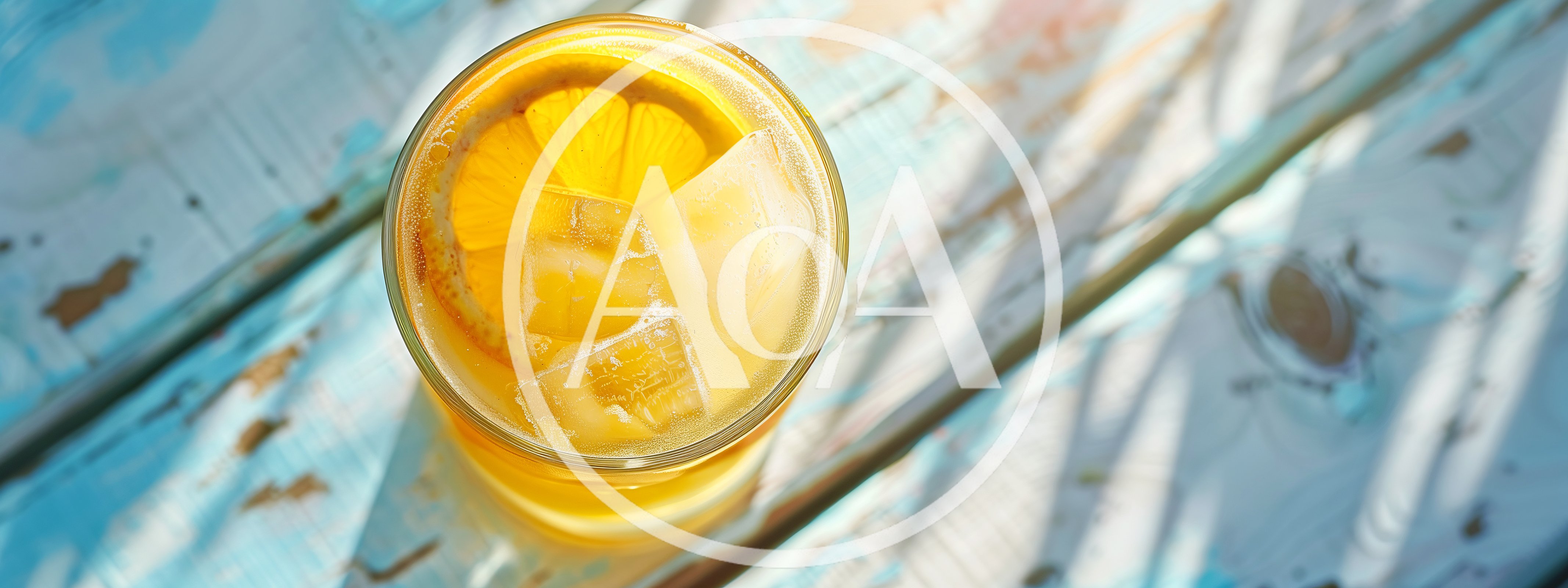 Glass Of Refreshing Orange Juice With Ice And Lemon