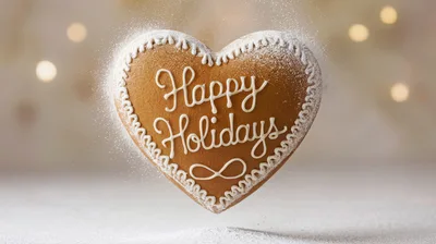 Heart Shaped Gingerbread Cookie With Happy Holidays Text