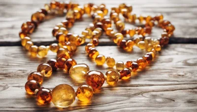 Amber Bead Necklace On Rustic Wooden Surface