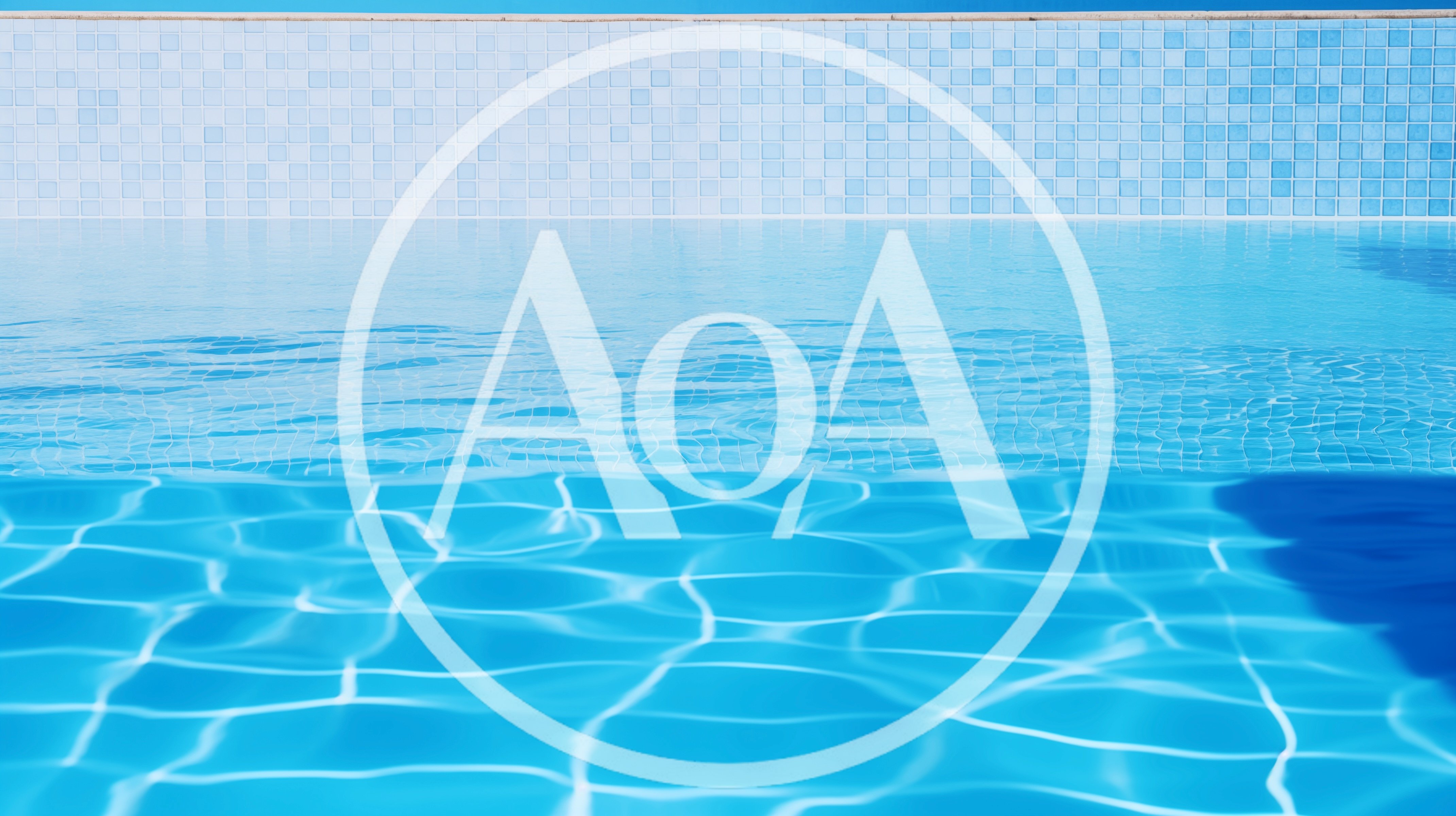 Clear Blue Water In A Tiled Swimming Pool