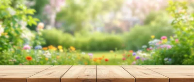 Wooden Table Surface Against Blurred Garden Background
