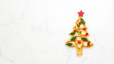 Christmas Tree Shaped Pizza on Marble Background