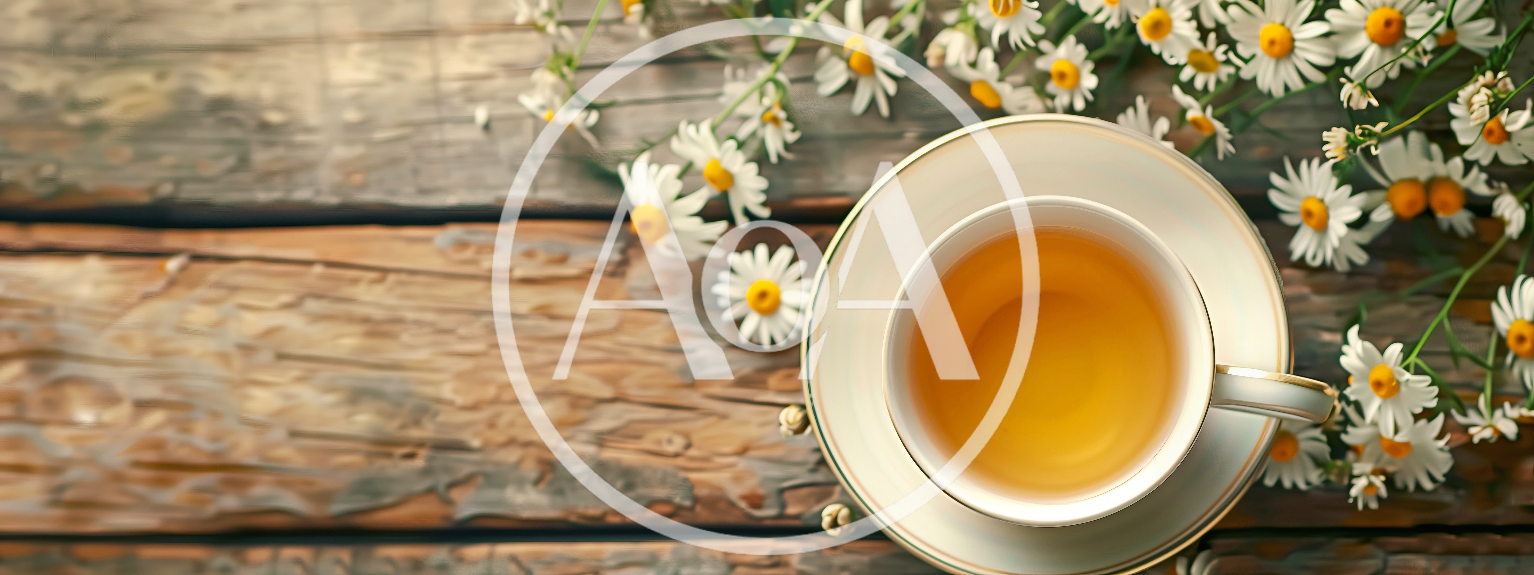 Chamomile Tea Cup With Fresh Flowers On Wooden Table