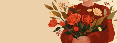 Person Holding A Vibrant Bouquet Of Autumn Flowers