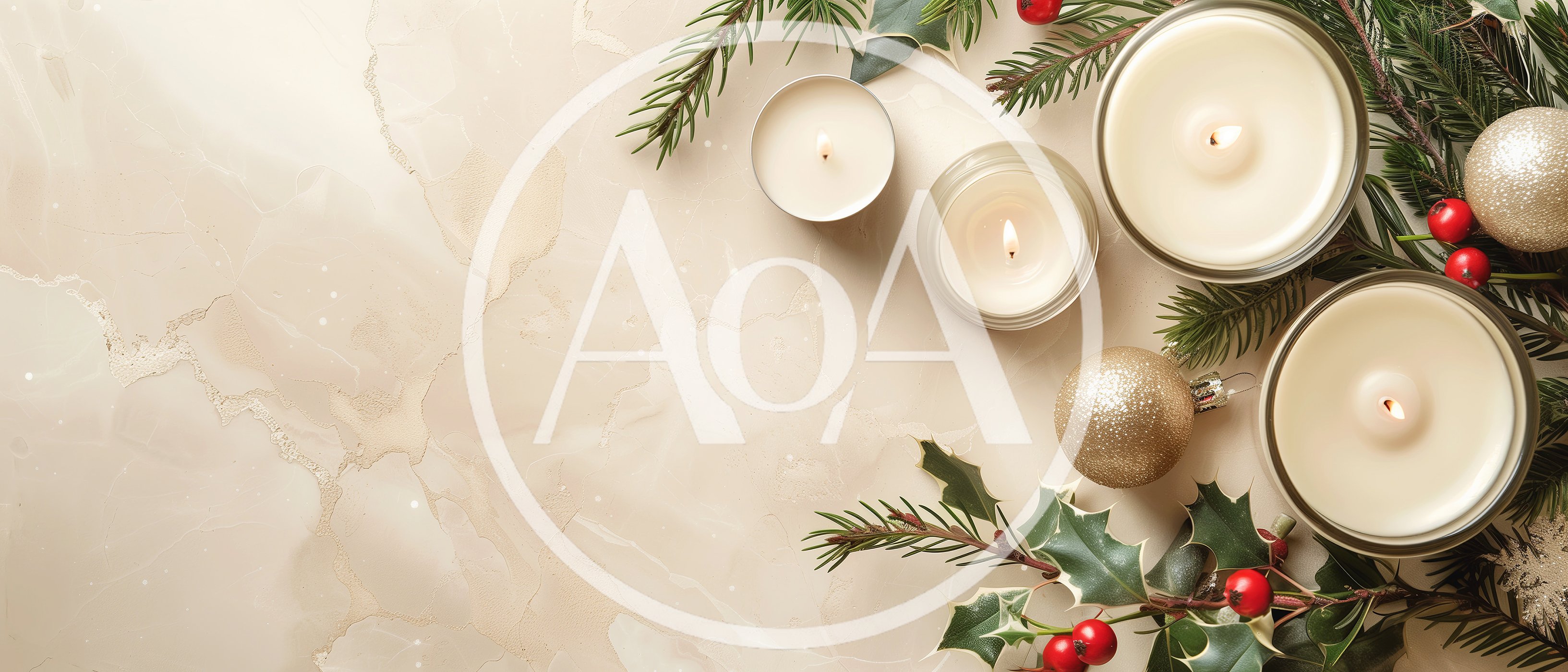 Christmas Candles and Ornaments on Marble Surface
