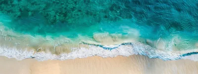 Aerial View Of Tropical Beach With Turquoise Waves
