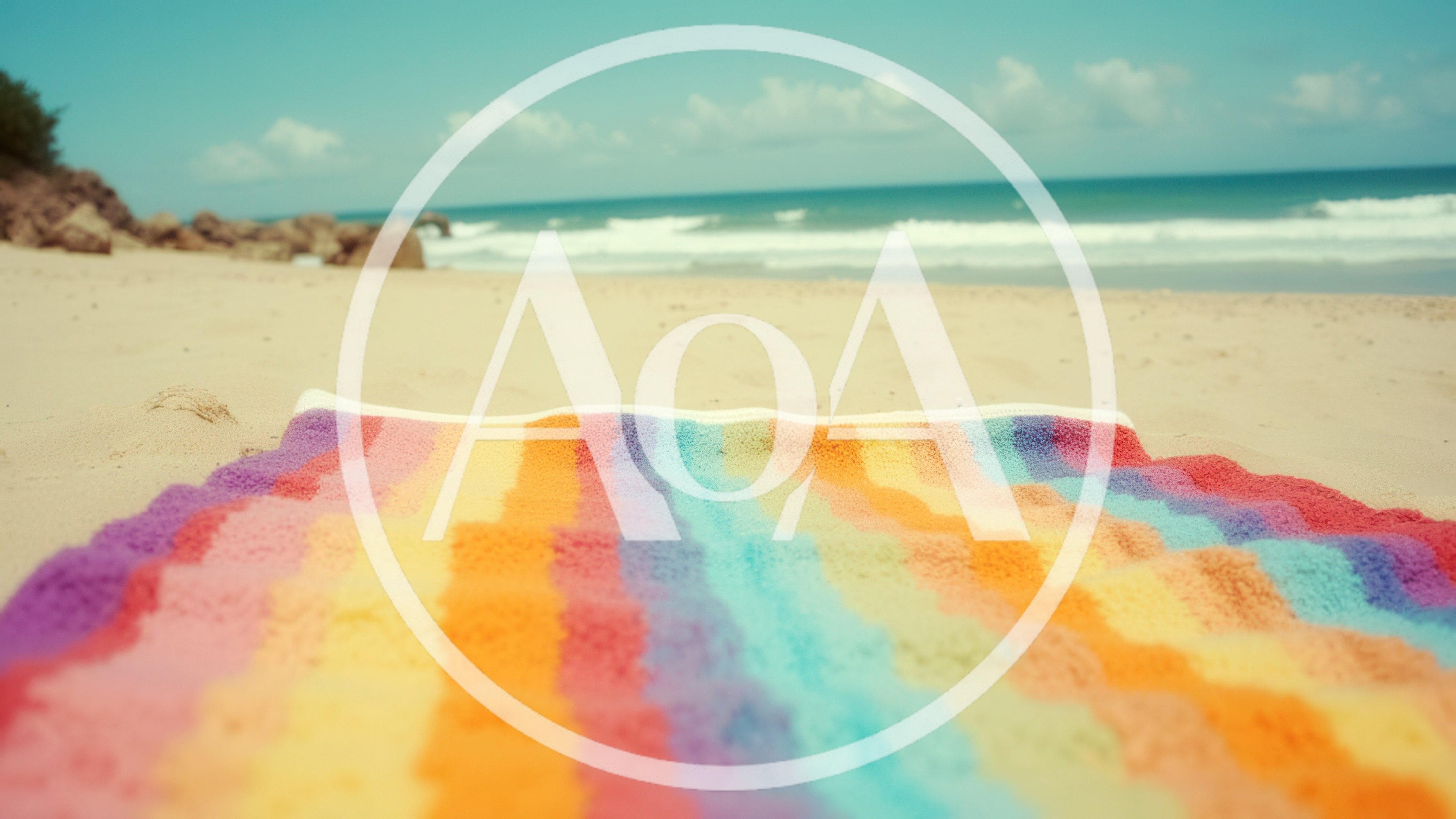 Colorful Striped Beach Towel On Sandy Shore