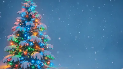 Snow Falling On A Decorated Christmas Tree