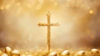 Wooden Cross Surrounded By Golden Easter Eggs