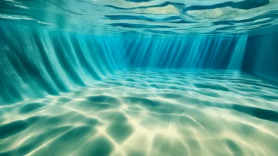 Underwater View Of Swimming Pool Floor With Sunlight Caustics