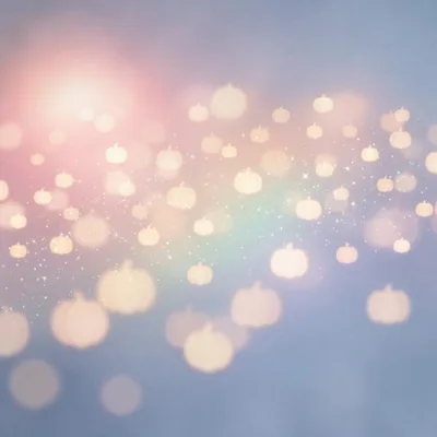 Abstract Pumpkin Bokeh Background With Sparkling Stars