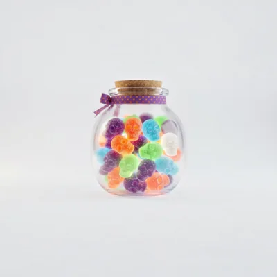Glass Jar Filled With Colorful Gummy Skull Candies