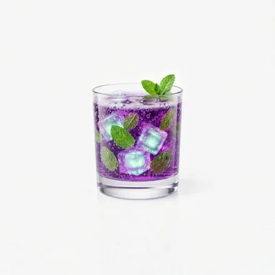 Refreshing Purple Cocktail With Mint And Glowing Ice Cubes