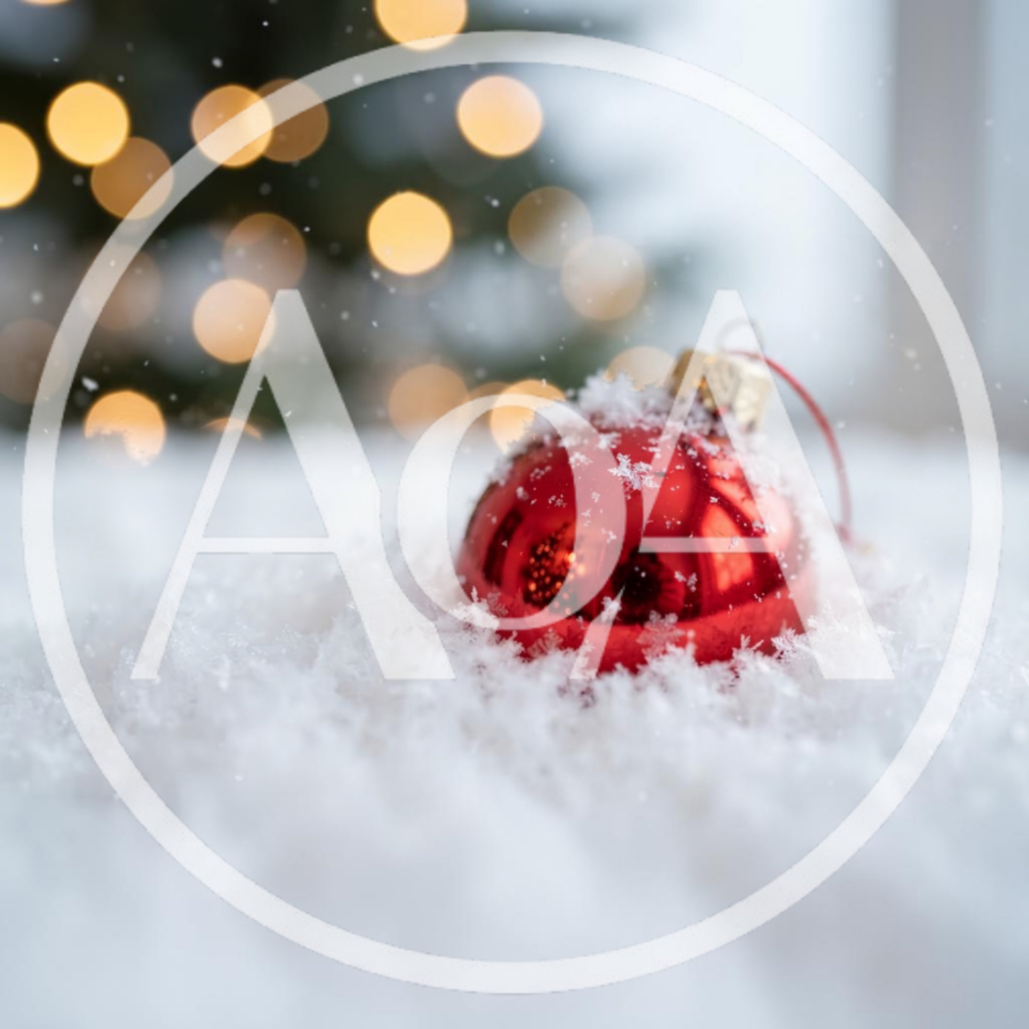 Red Christmas Ornament Resting In Fresh White Snow