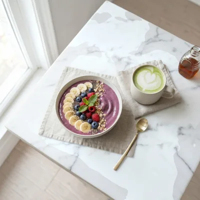 Acai Smoothie Bowl With Matcha Latte On Marble Table