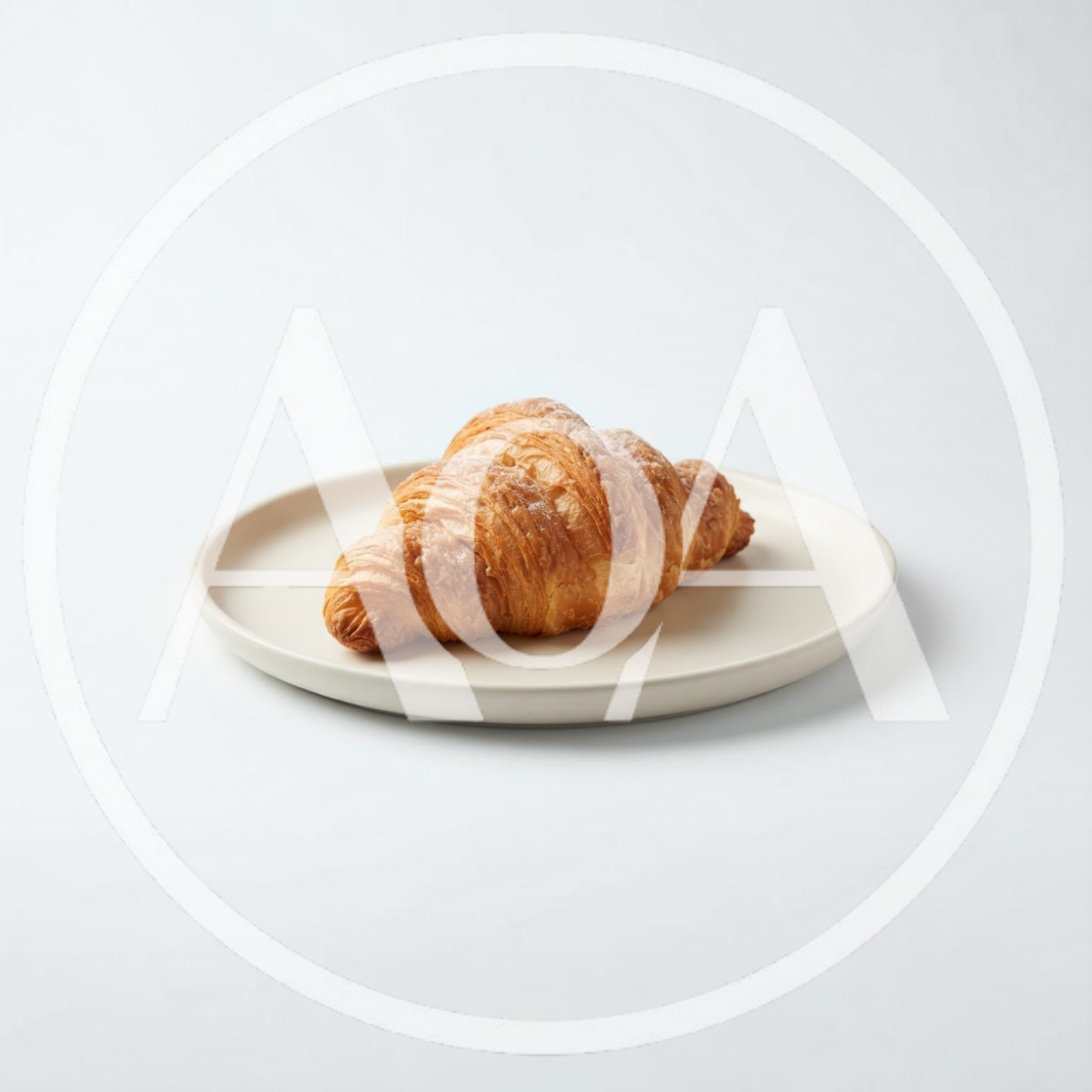 Fresh Golden Croissant On A Minimalist Plate