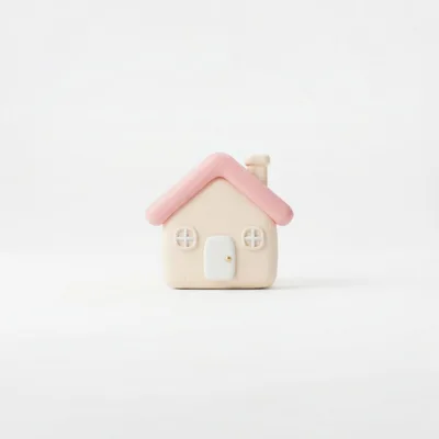 Small Clay House Figurine On White Background