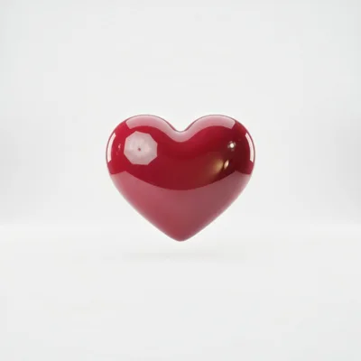 Glossy Red Heart Floating On White Background