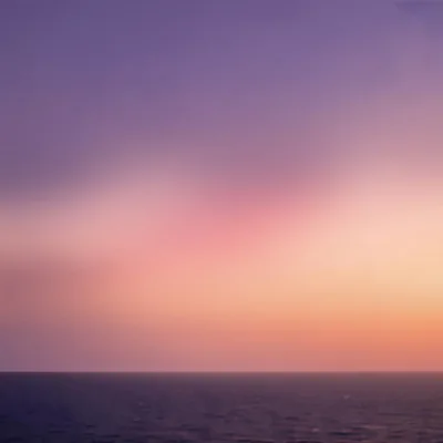 Serene Sunset Over The Calm Ocean Horizon