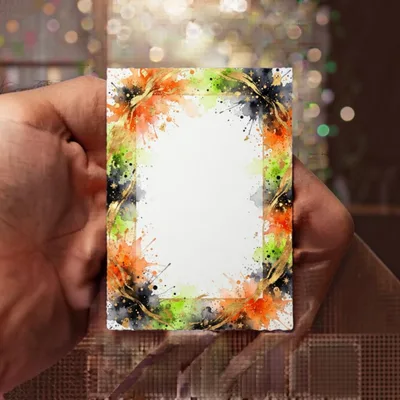 Hand Holding A Halloween Watercolor Frame Card