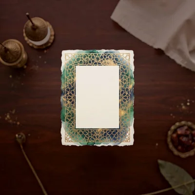 Blank Decorative Islamic Frame on Dark Wooden Table