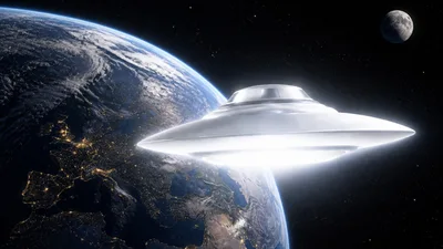 disc-shaped UFO alien spaceship flying in space near Earth on the background of Moon