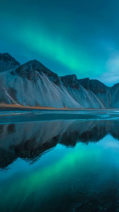 Stunning Aurora Borealis Over Vestrahorn Mountain In Iceland