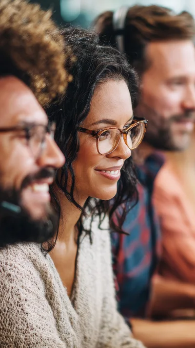 Diverse Customer Service Representatives Working In A Call Center