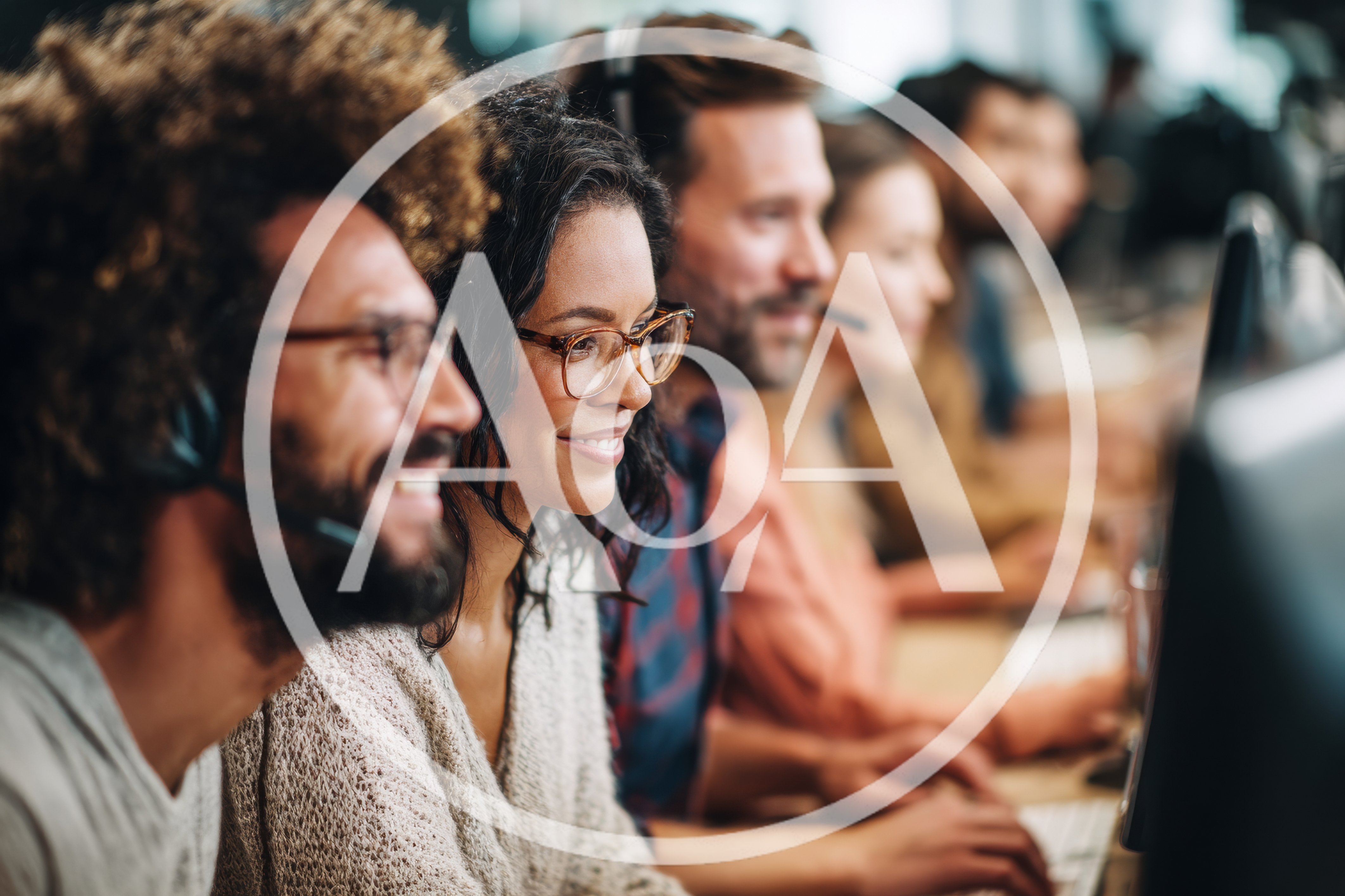 Diverse Customer Support Team Working In Modern Office