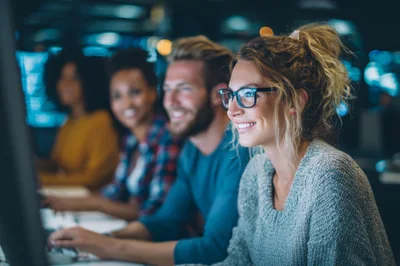 Diverse Team Of Software Developers Working In Office