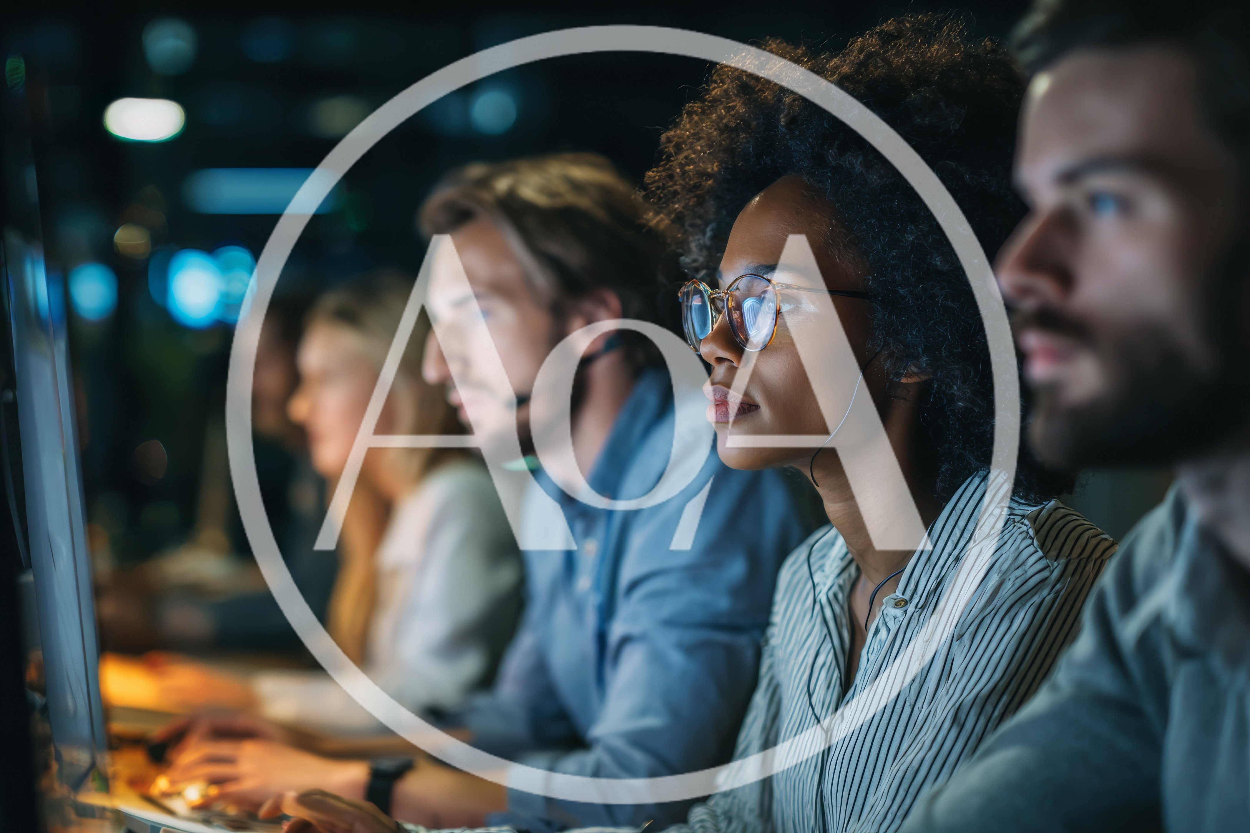 Diverse Team Working In A Modern Night Office