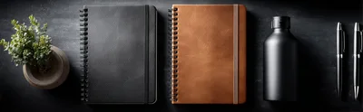 Flat Lay Of Notebooks And Stationery On Dark Surface