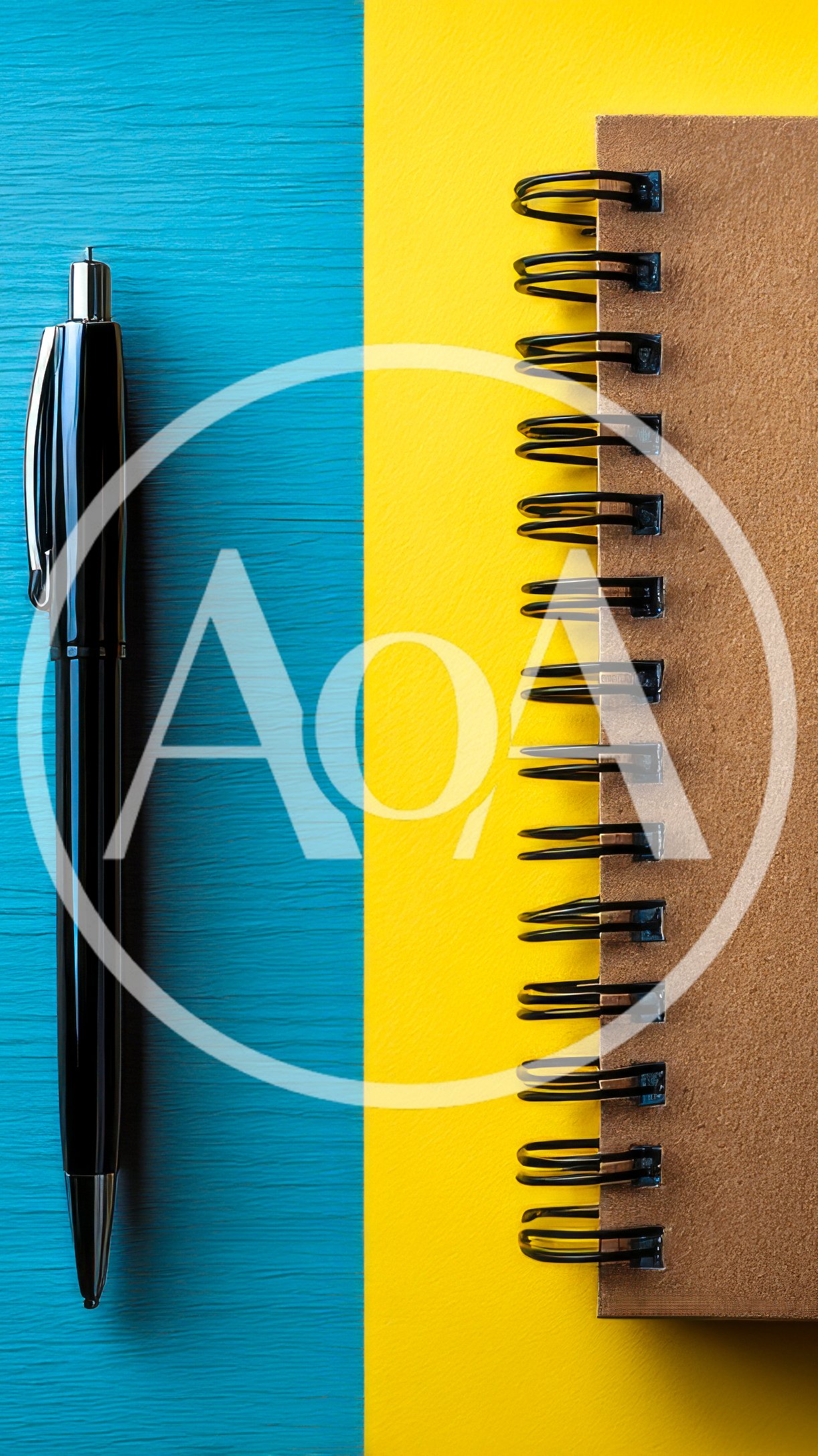 Black Pen And Spiral Notebook On Blue And Yellow Background
