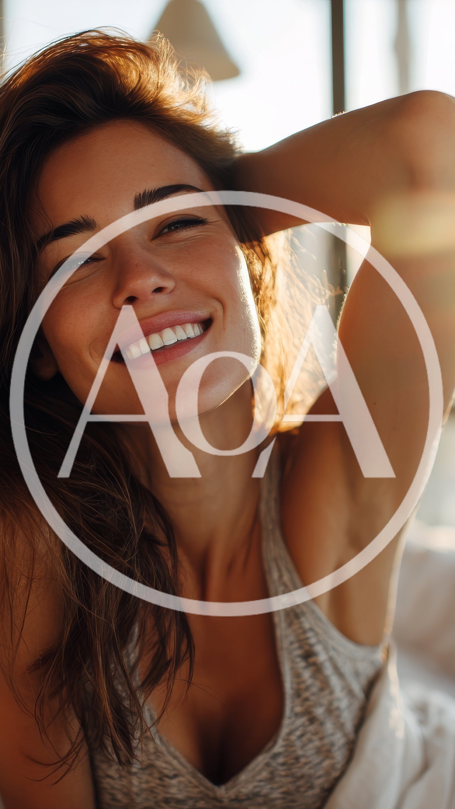 Smiling Woman Relaxing In Bed During Morning Sunlight