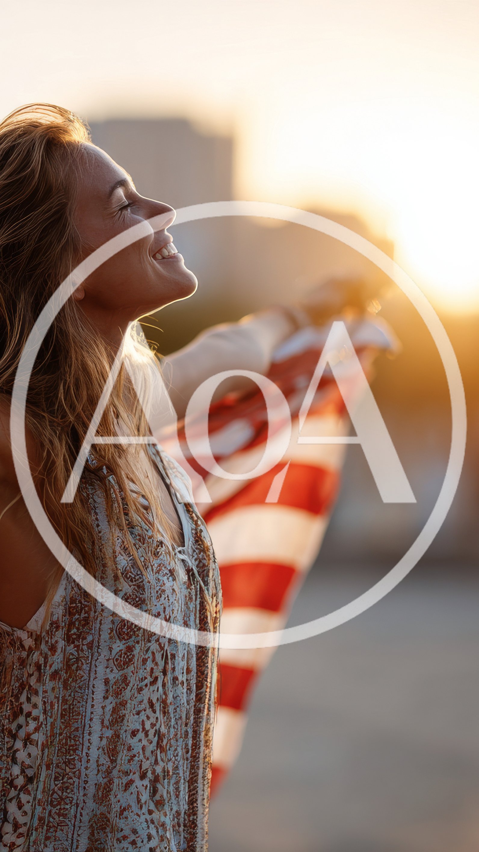 Young Woman Celebrating With American Flag At Sunset