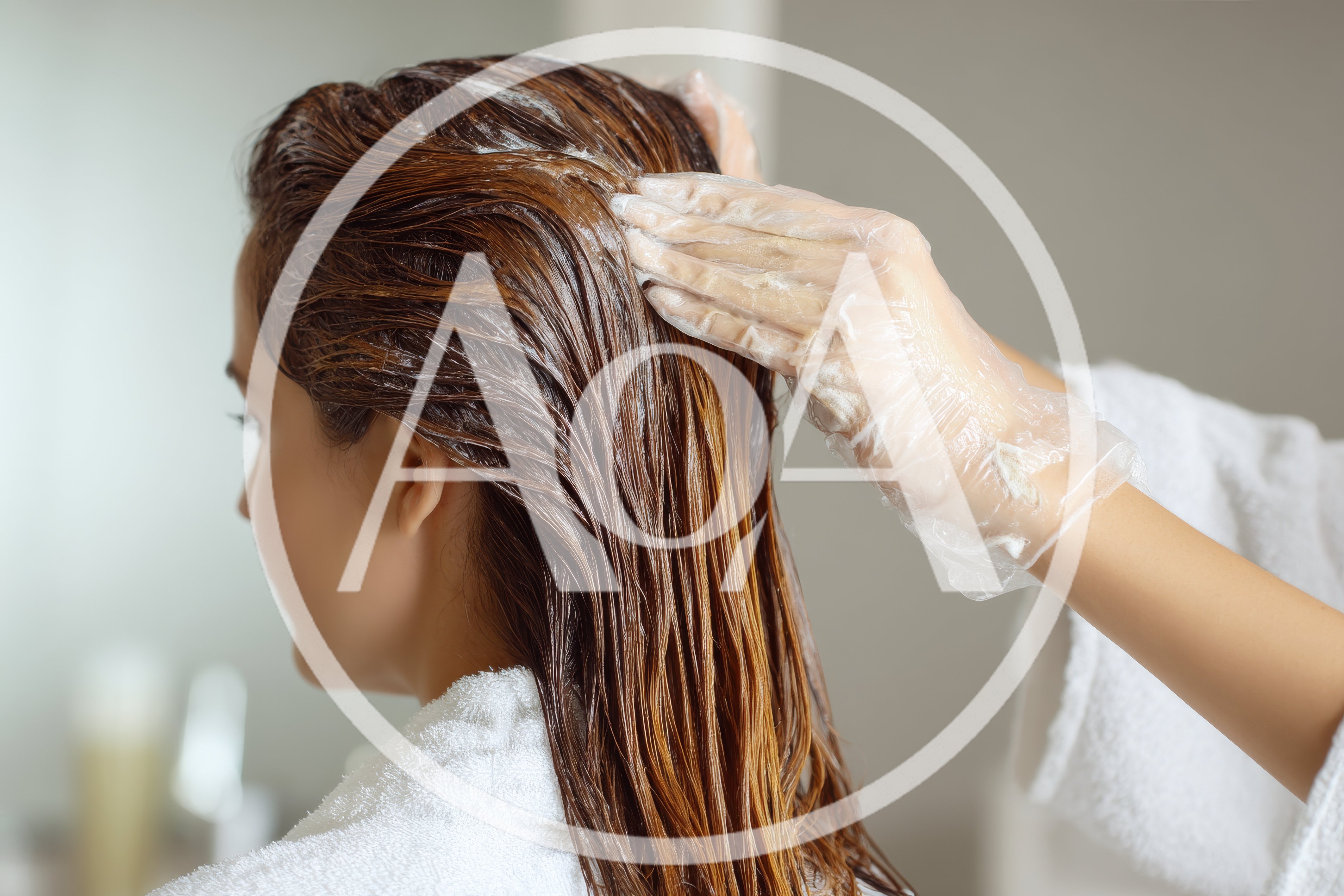 Woman Receiving Professional Hair Dye Treatment