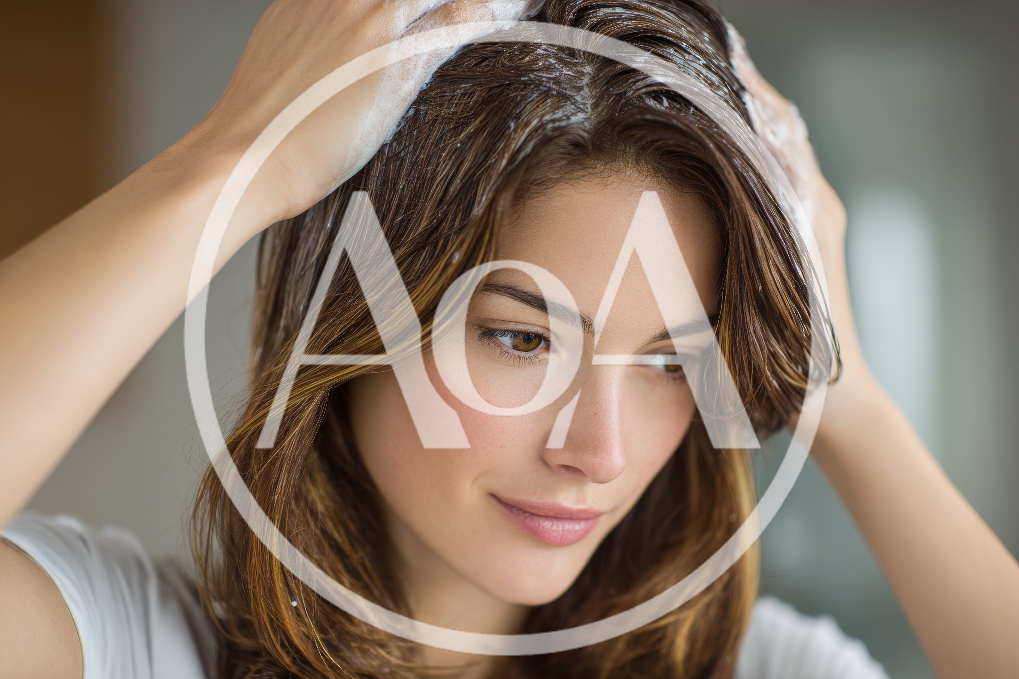 Young Woman Washing Her Hair With Shampoo