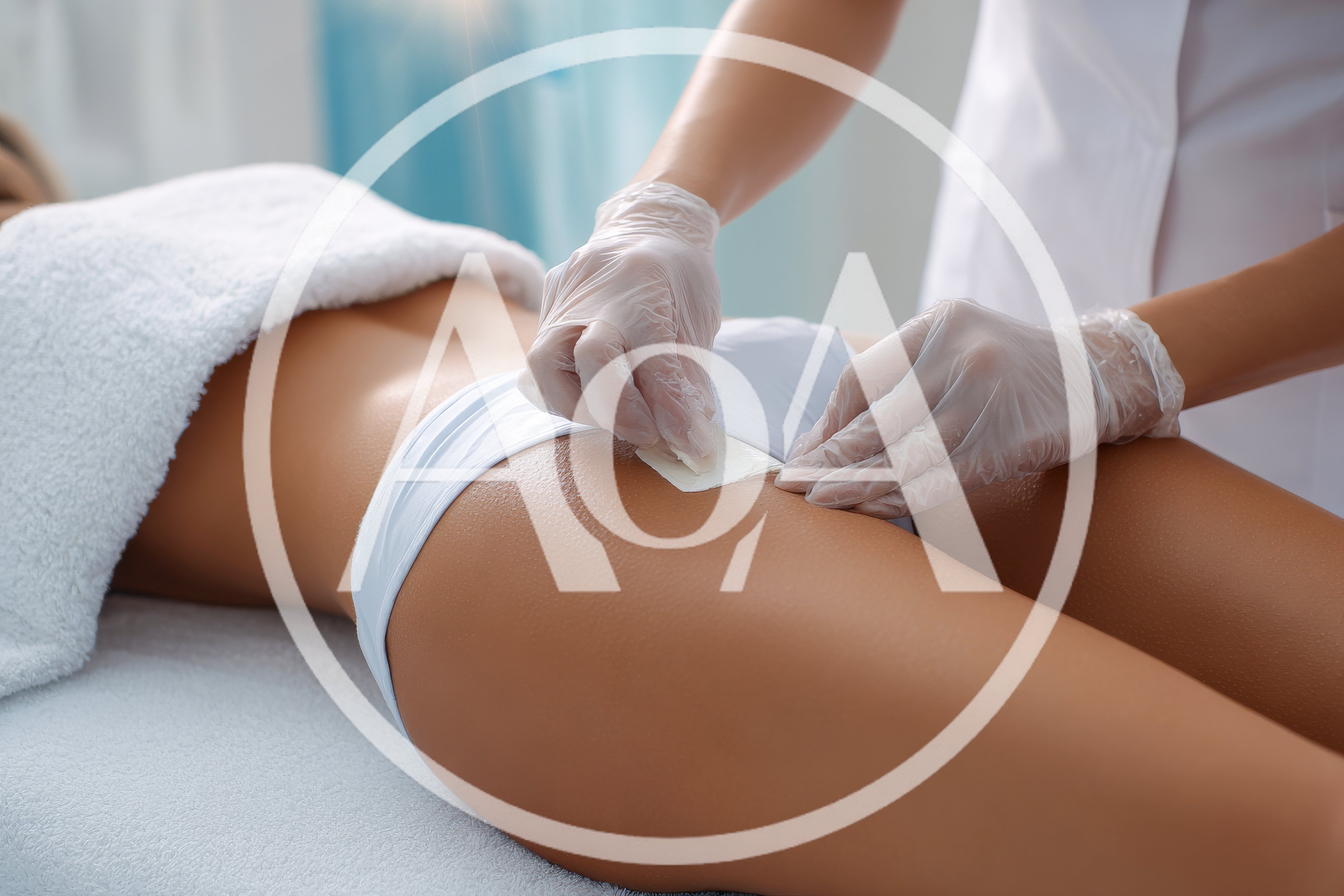 Professional Waxing Treatment On A Client's Thigh