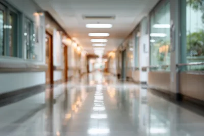 Empty Hospital Corridor With Blurred Interior Lighting