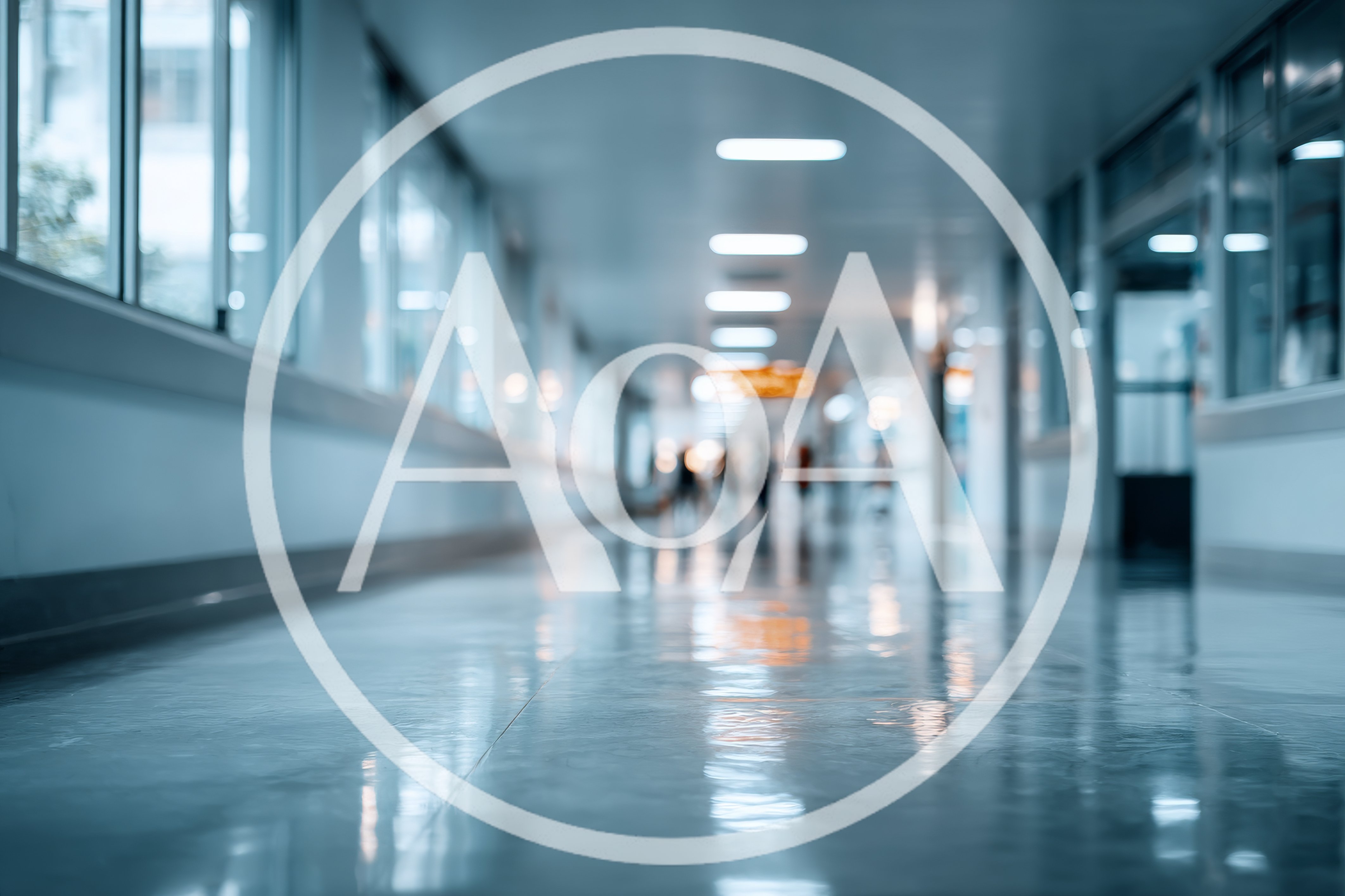Blurred Hospital Corridor With People Walking